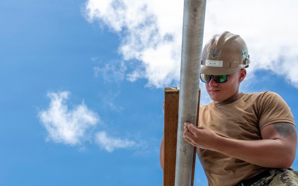 NMCB 1 installs walkway roof at Saipan Southern High School