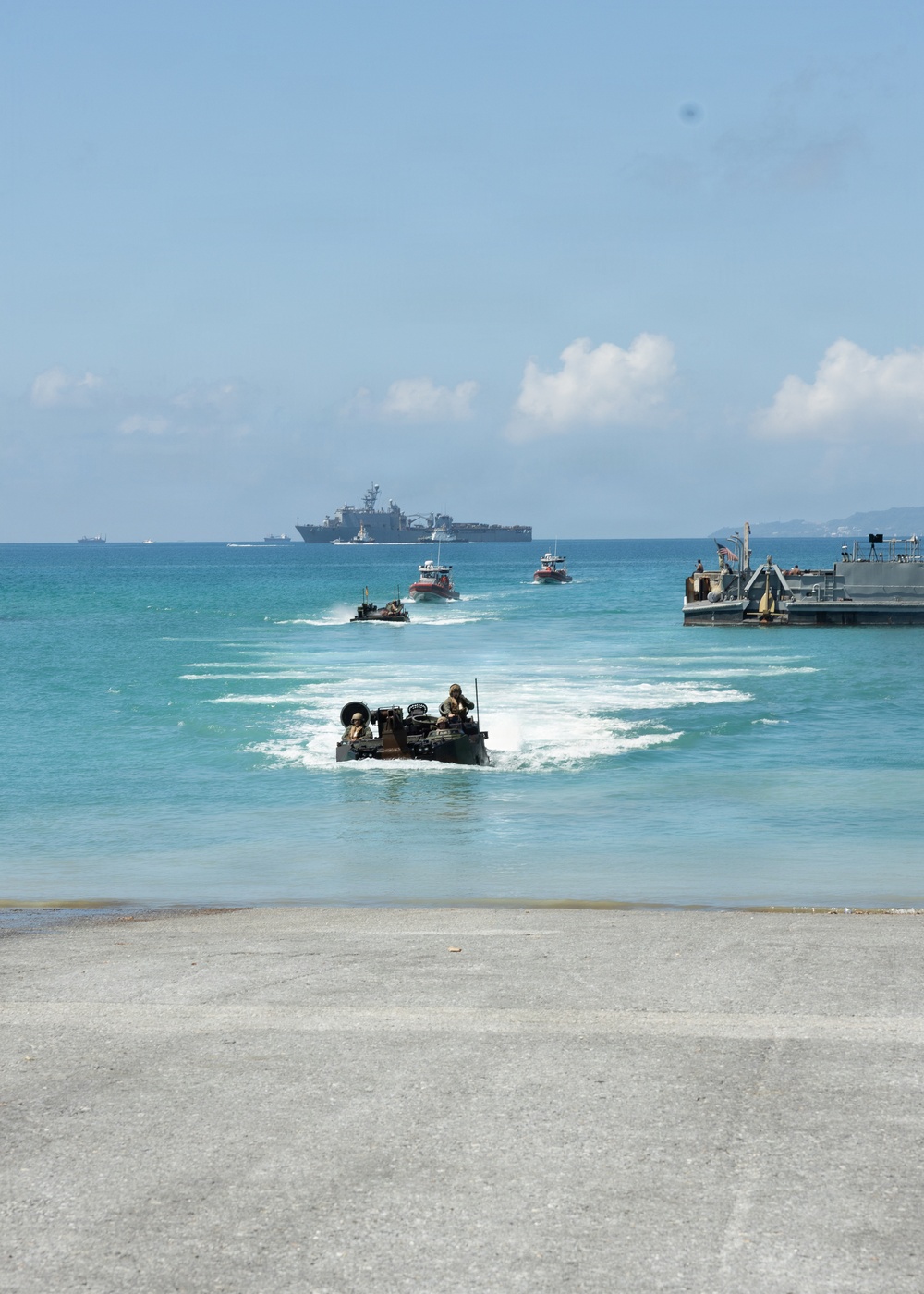 USS Rushmore ports and off-loads equipment