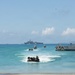 USS Rushmore ports and off-loads equipment