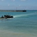 USS Rushmore ports and off-loads equipment