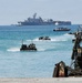 USS Rushmore ports and off-loads troops and equipment