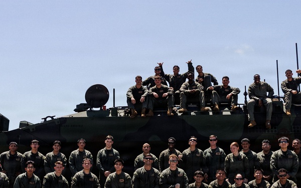 USS Rushmore ports and off-loads troops and equipment