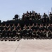 USS Rushmore ports and off-loads troops and equipment