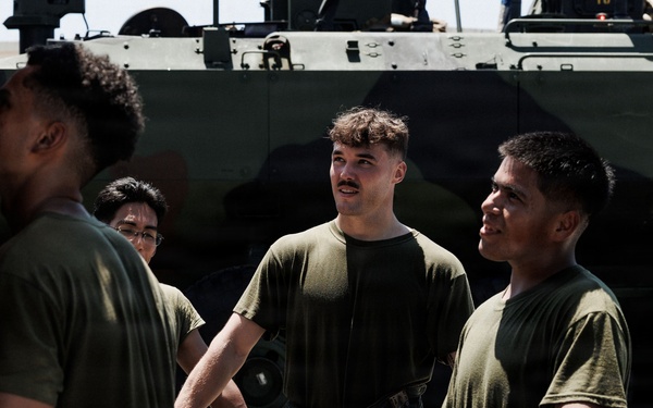 USS Rushmore ports and off-loads troops and equipment