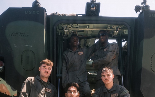 USS Rushmore ports and off-loads troops and equipment