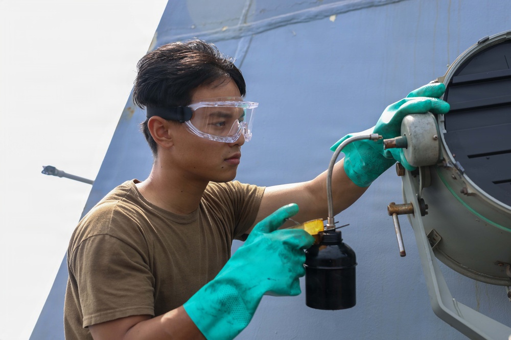 John Finn conducts maintenance