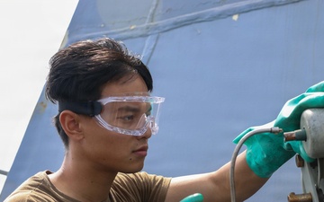John Finn conducts maintenance