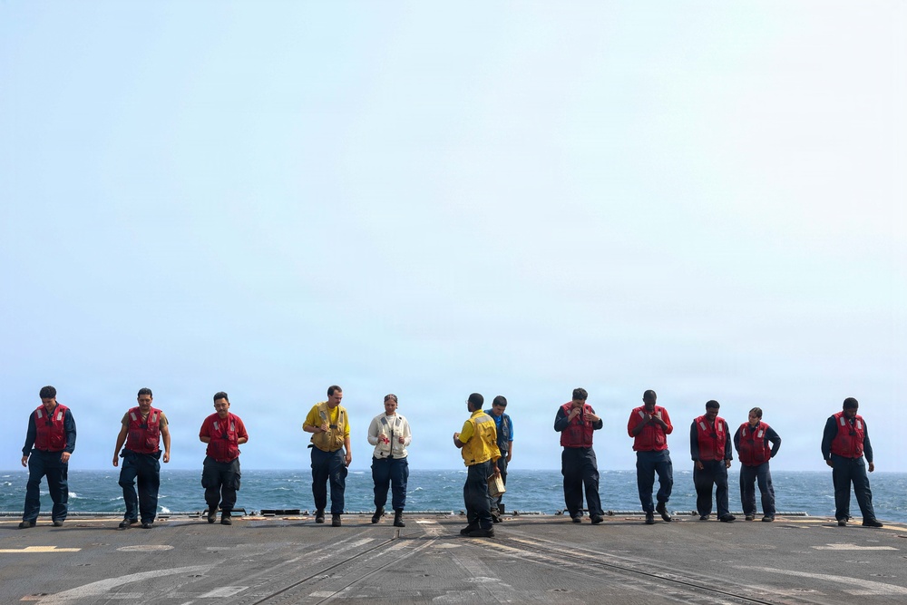 John Finn Conducts Flight Quarters