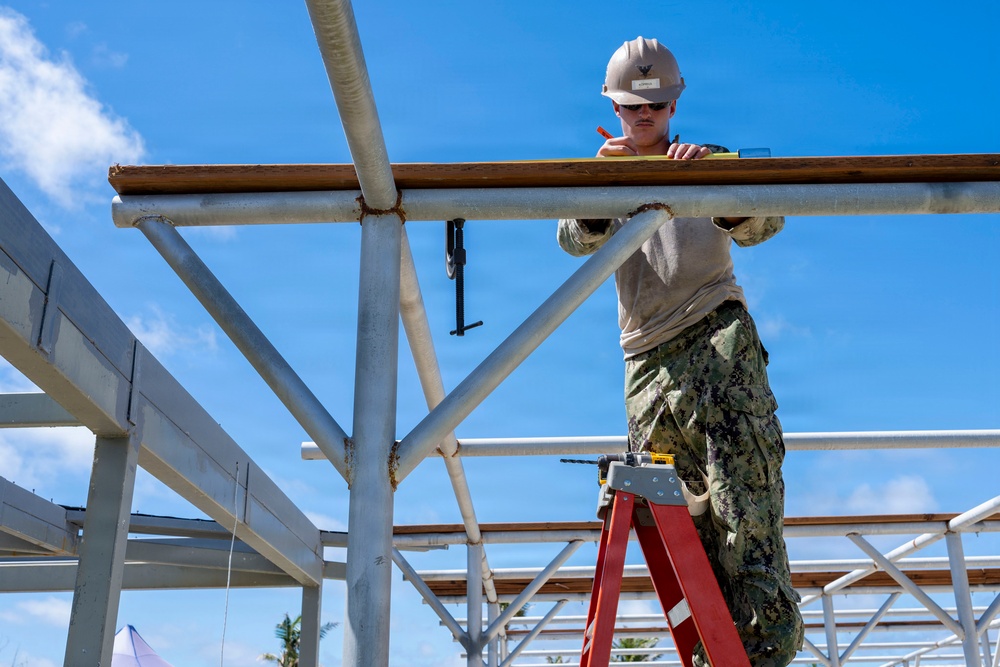 NMCB 1 installs walkway roof at Saipan Southern High School