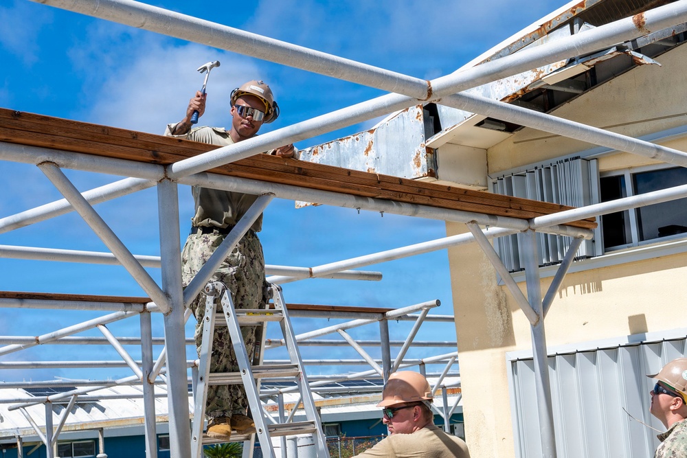 NMCB 1 installs walkway roof at Saipan Southern High School