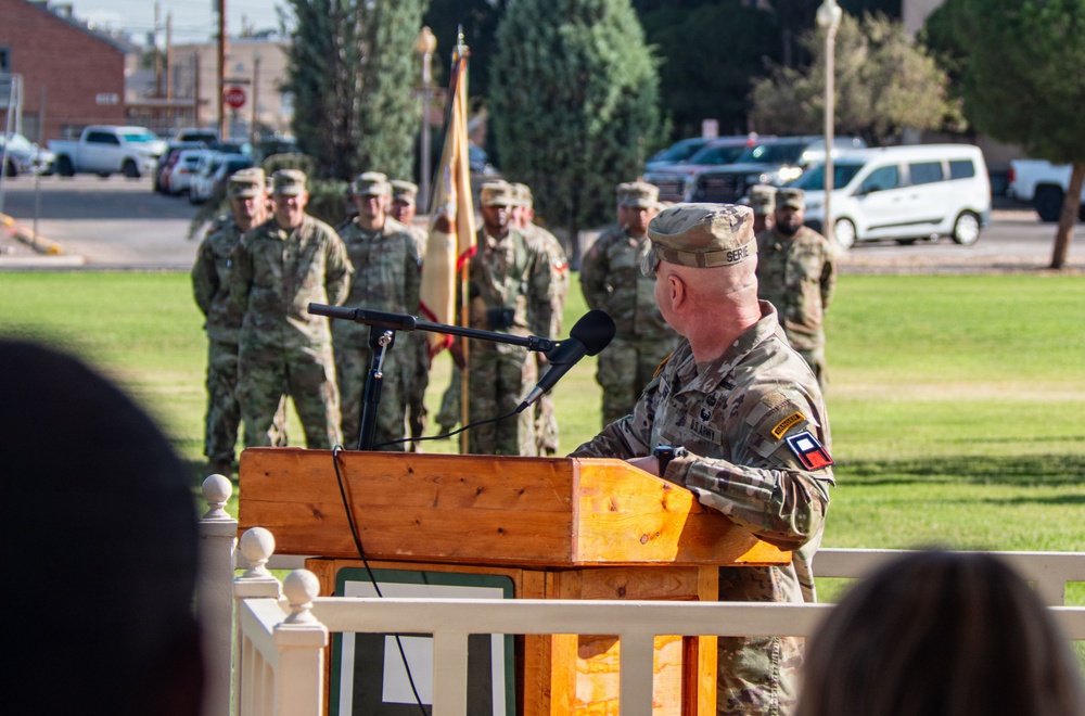 U.S. Army soldier addresses formation during military ceremony at Fort Bliss, Texas