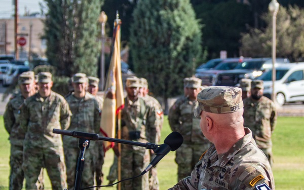 U.S. Army soldier addresses formation during military ceremony at Fort Bliss, Texas