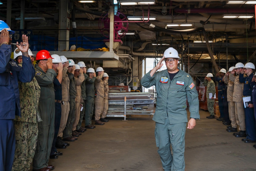 Lt. Cmdr. Guzman Receives Award and Rung Off