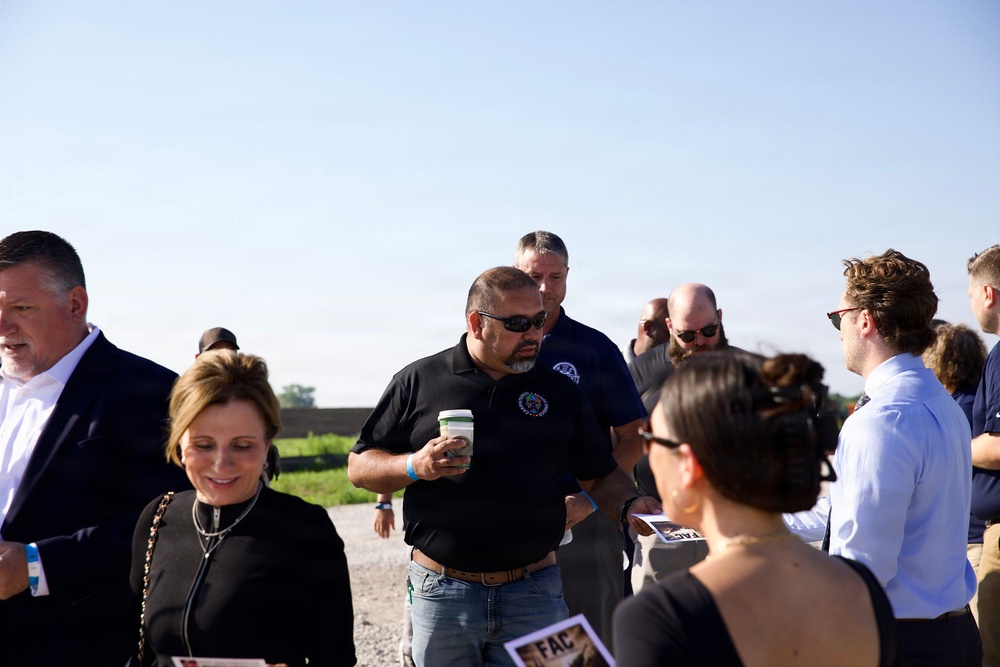 Civilian and military officials gather at the groundbreaking ceremony for the future artillery complex at the Iowa Army Ammunition Plant.