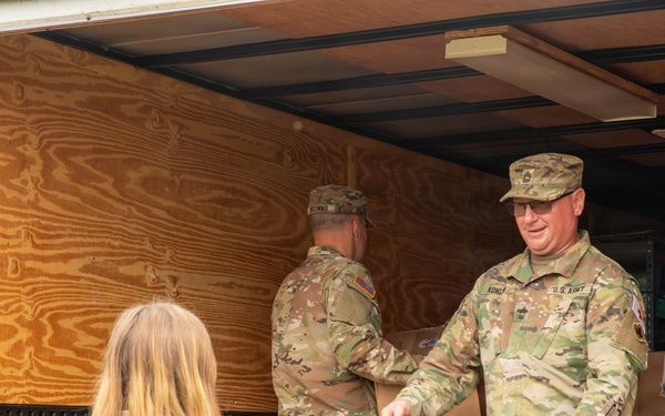 National Guard, Scouts Pack Hygiene Kits for West Virginia Flood Victims