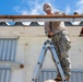 NMCB 1 installs walkway roof at Saipan Southern High School