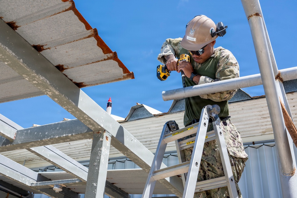 NMCB 1 installs walkway roof at Saipan Southern High School