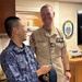USS Chafee Executive Officer Presents JS Chōkai Executive Officer With Pen