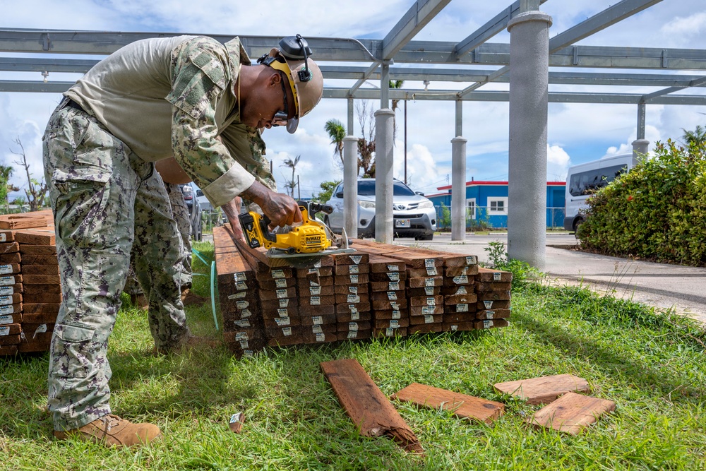 NMCB 1 installs walkway roof at Saipan Southern High School