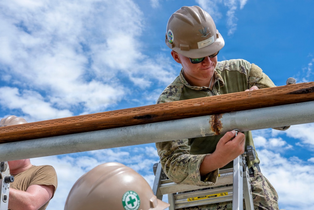 NMCB 1 installs walkway roof at Saipan Southern High School