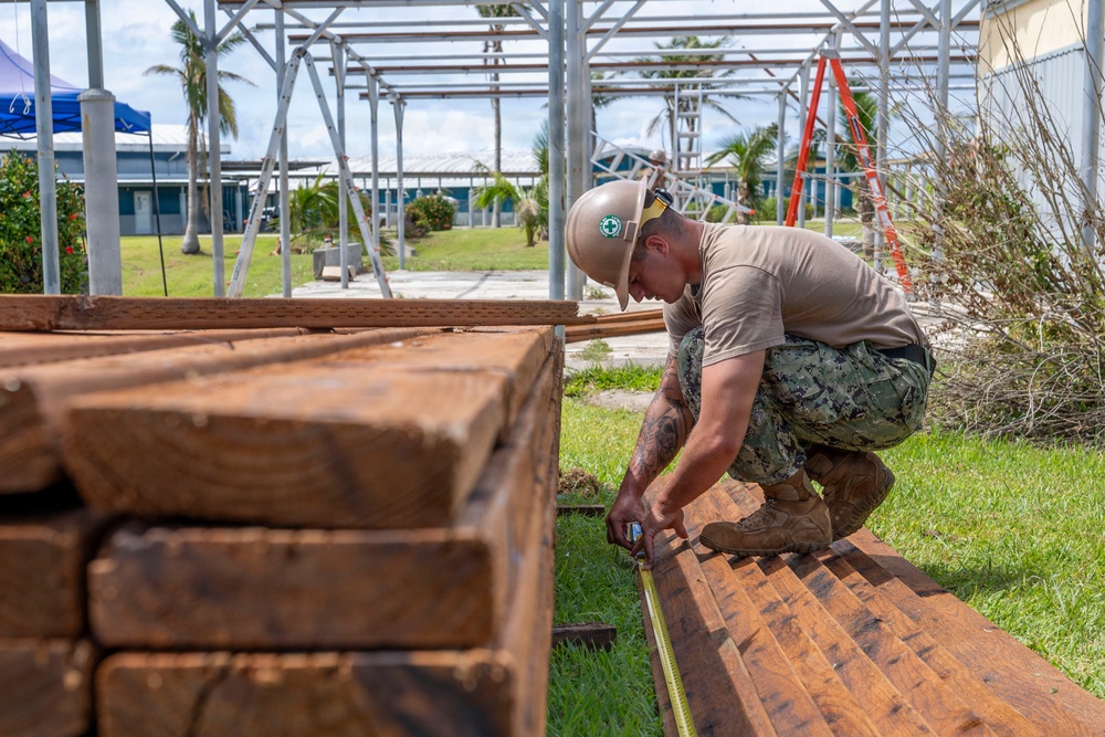 NMCB 1 installs walkway roof at Saipan Southern High School