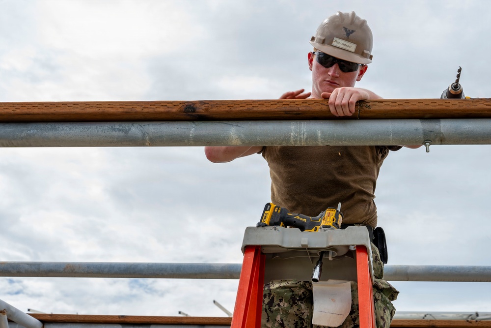 NMCB 1 installs walkway roof at Saipan Southern High School