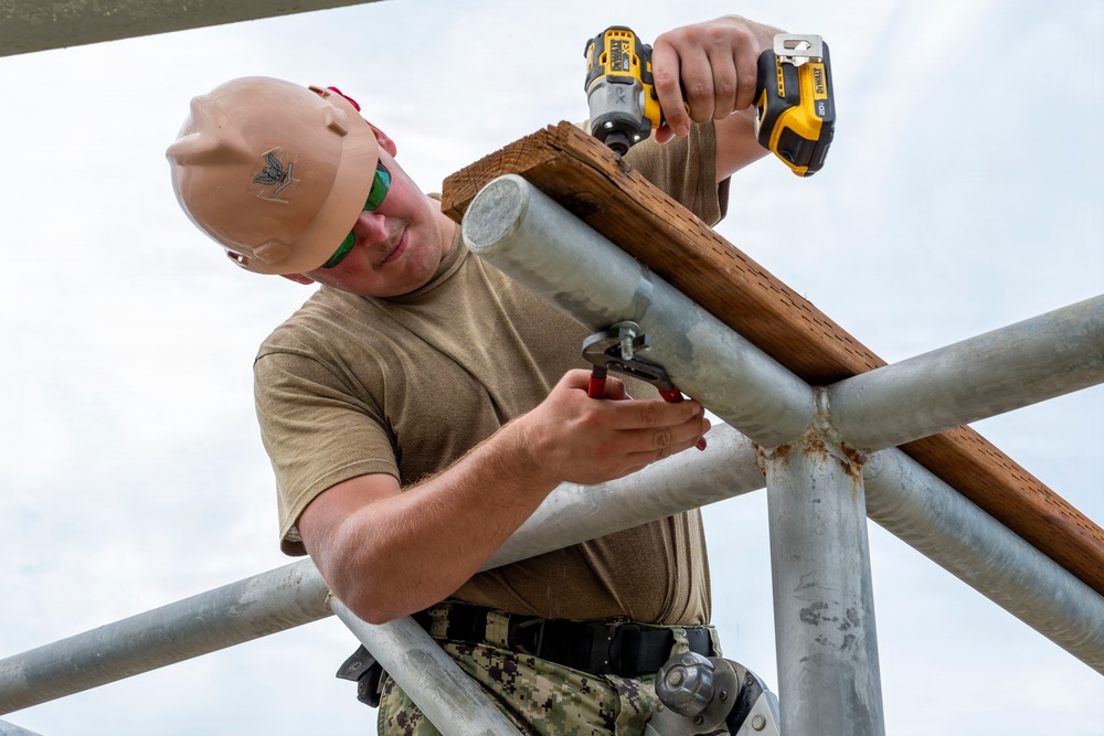 NMCB 1 installs walkway roof at Saipan Southern High School