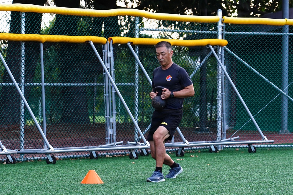 Commanding general leads through physical training