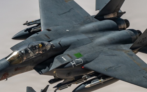KC-135 refuels F-15 in CENTCOM operations