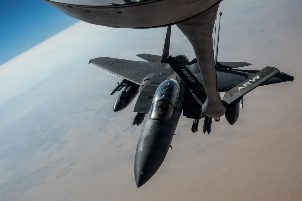 KC-135 refuels F-15 for strategic support