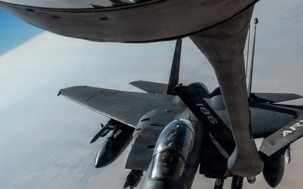 KC-135 refuels F-15 for strategic support
