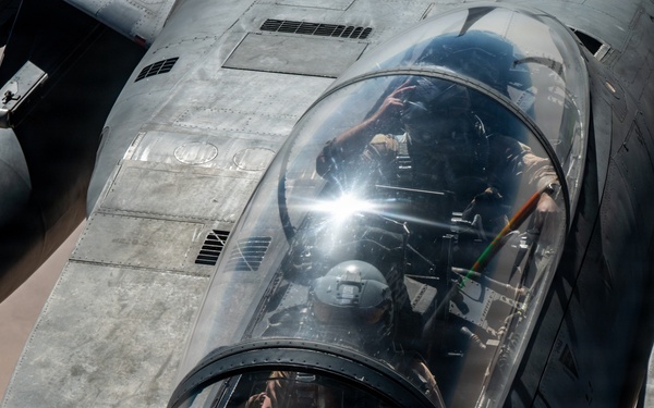 KC-135 refuels F-15 for strategic support