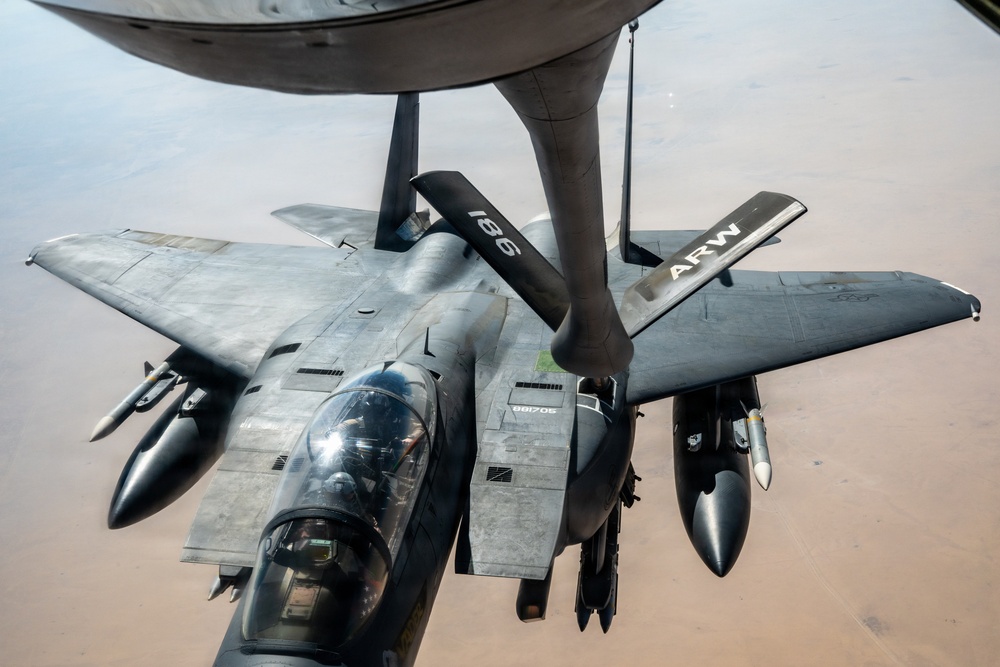 KC-135 refuels F-15 for strategic support