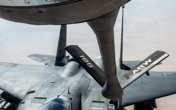 KC-135 refuels F-15 for strategic support