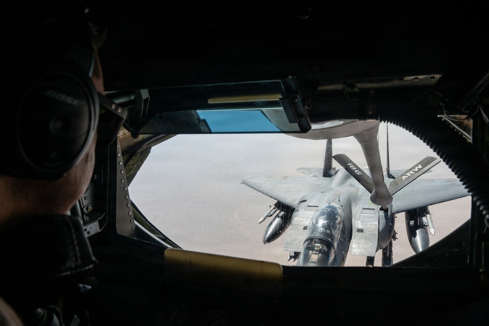 KC-135 refuels F-15 for strategic support