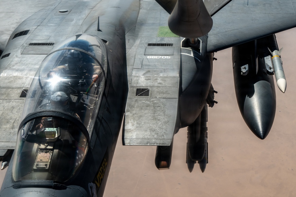 KC-135 refuels F-15 for strategic support