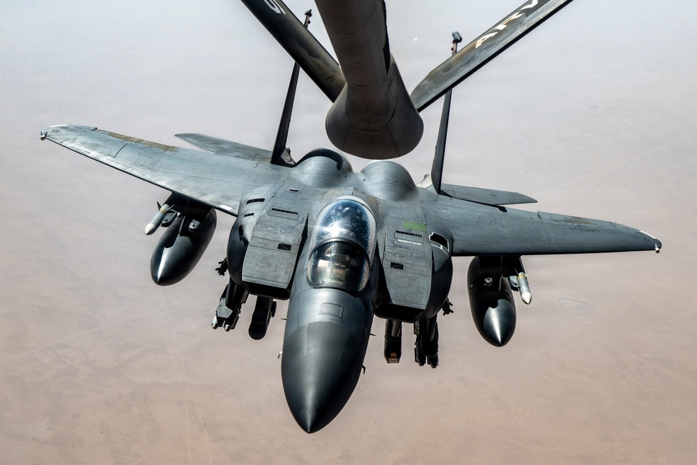 KC-135 refuels F-15 for strategic support