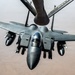 KC-135 refuels F-15 for strategic support