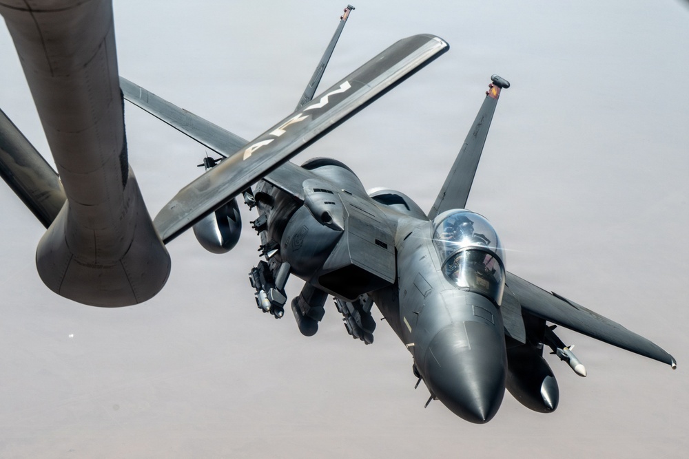 KC-135 refuels F-15 for strategic support