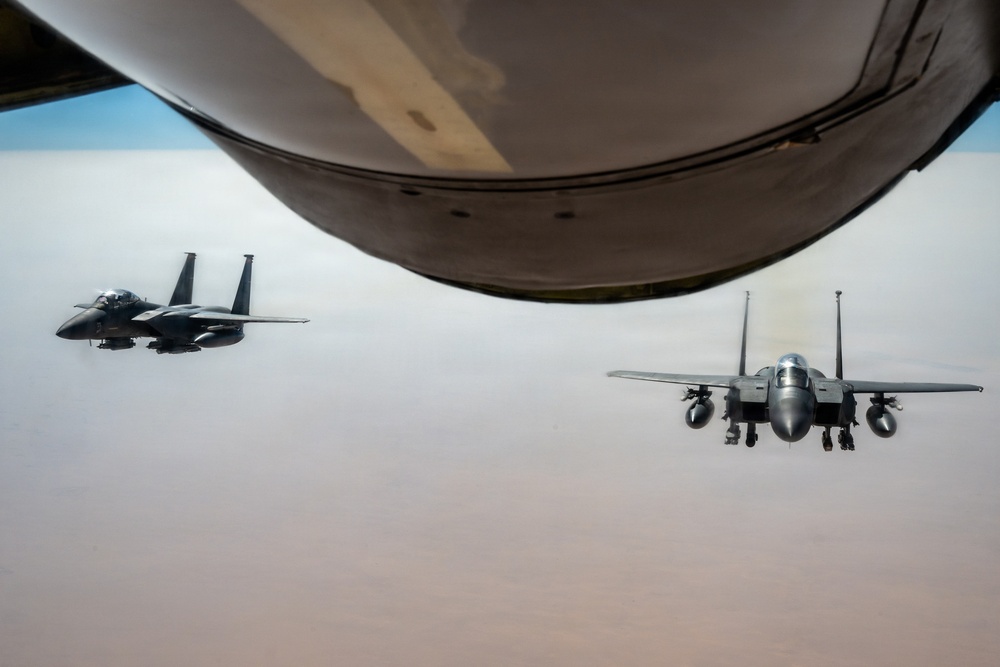 KC-135 refuels F-15 for strategic support