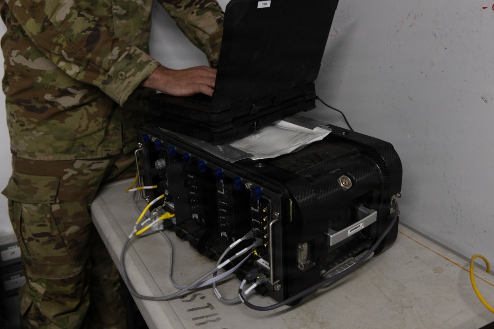US Soldier uses tactical communications and video-teleconferencing capability