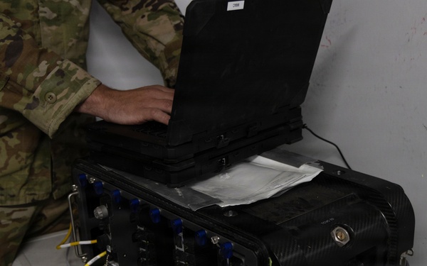 US Soldier uses tactical communications and video-teleconferencing capability
