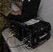 US Soldier uses tactical communications and video-teleconferencing capability