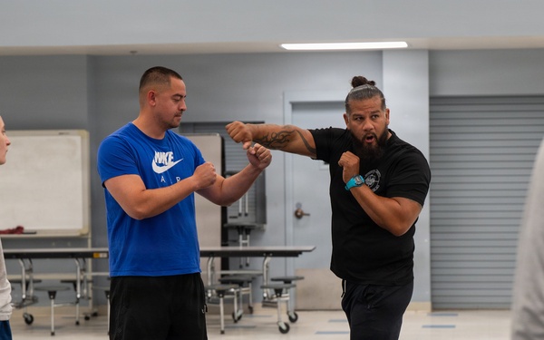 Security Forces sharpen close-quarters combat skills during combatives training