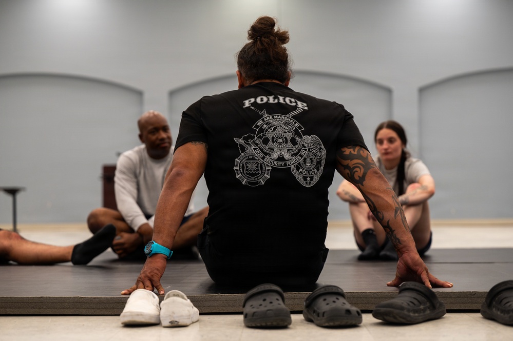 Security Forces sharpen close-quarters combat skills during combatives training