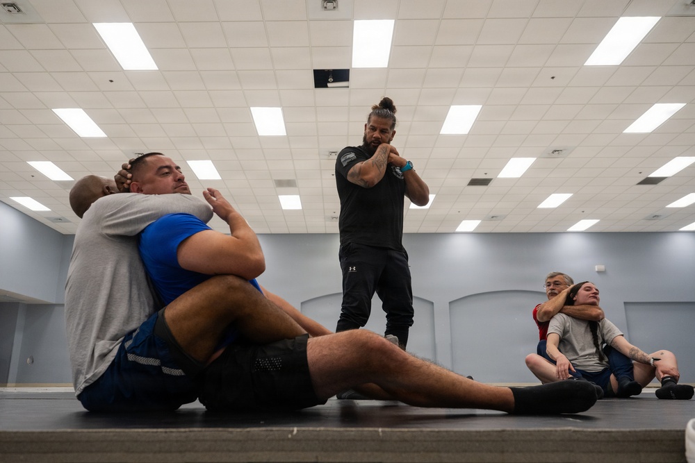 Security Forces sharpen close-quarters combat skills during combatives training
