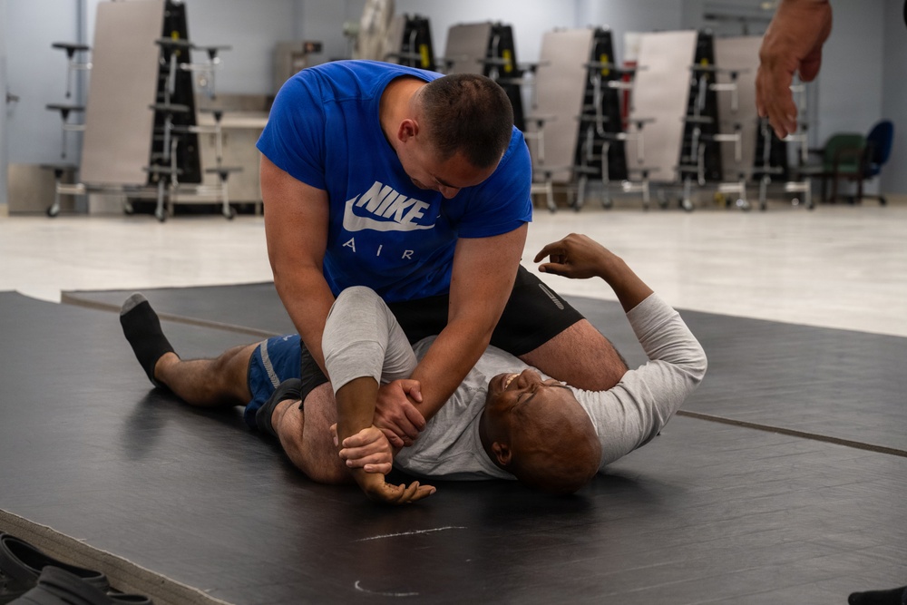 Security Forces sharpen close-quarters combat skills during combatives training