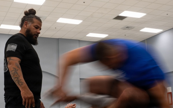 Security Forces sharpen close-quarters combat skills during combatives training