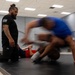 Security Forces sharpen close-quarters combat skills during combatives training