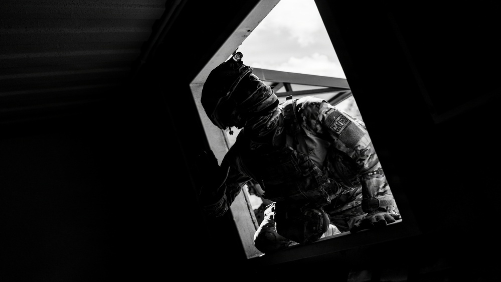 U.S. Navy and Peruvian Navy EOD participate in a dismounted response drill